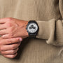"Northwall" watch with a maple and rock gray design on a person's wrist.