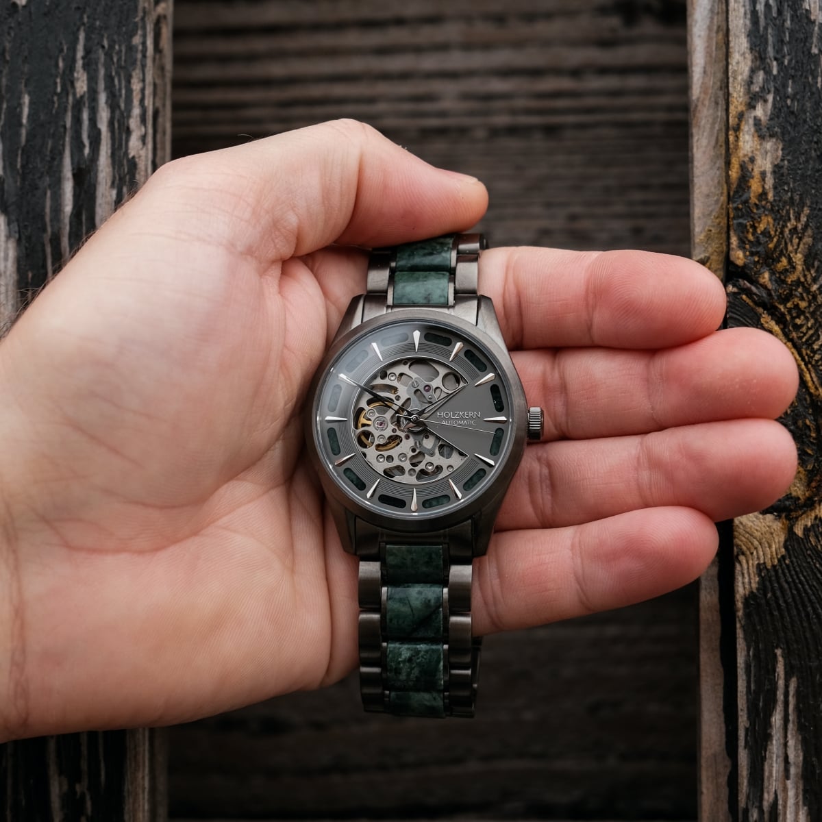 "Acraman" watch featuring a marble and dark gray design with a modern, intricate dial.