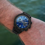 "Aoraki" watch featuring a lapis lazuli dial and black band with a sleek, modern design.
