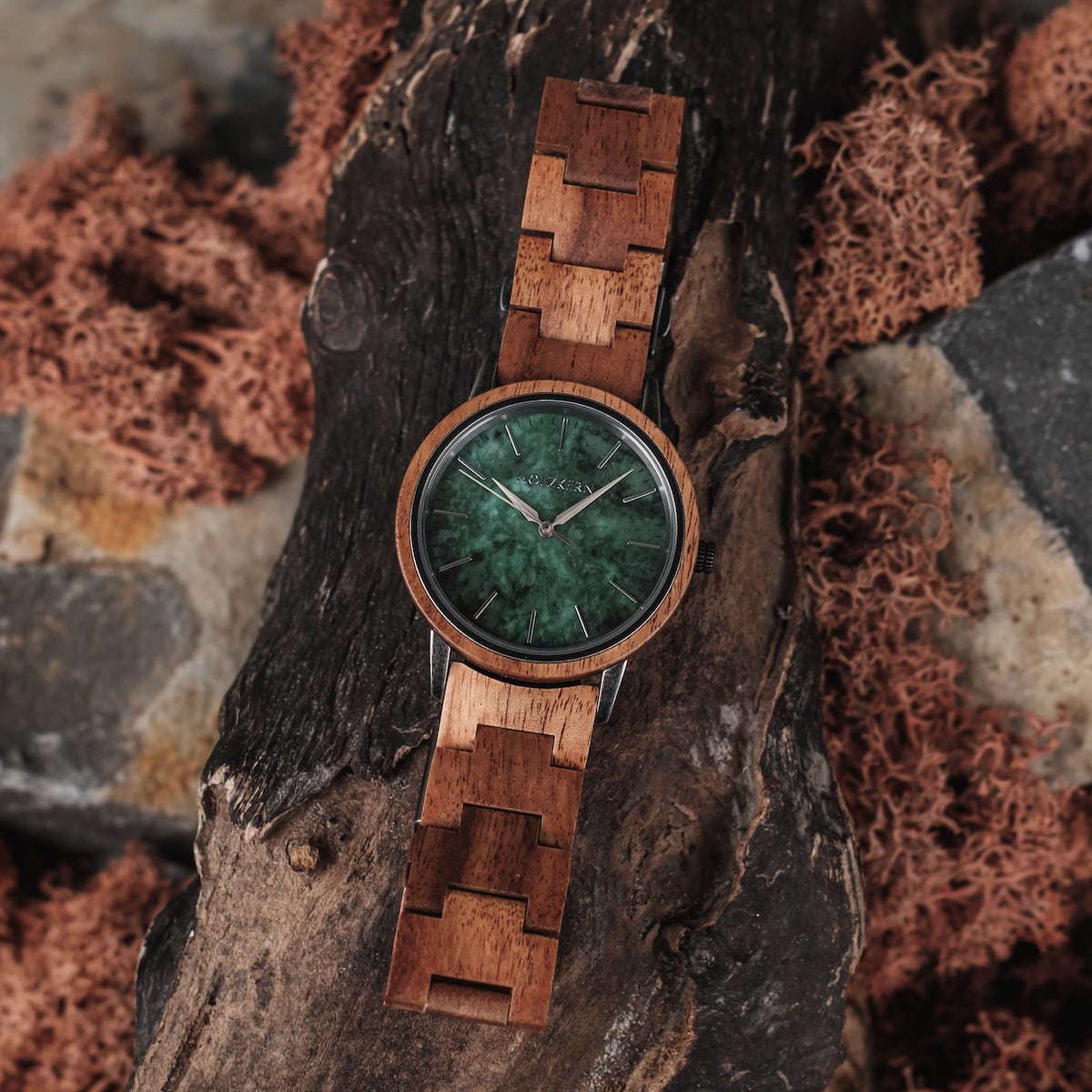 "Bob", a stylish wooden watch featuring koa and marble materials, read on a rustic background.