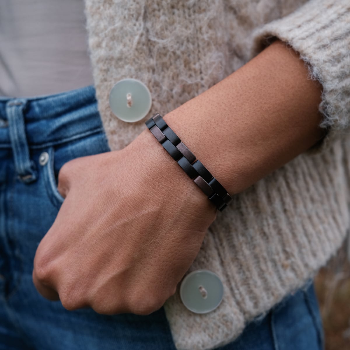 "Rondo" bracelet with a modern maple and antique copper design on a wrist.