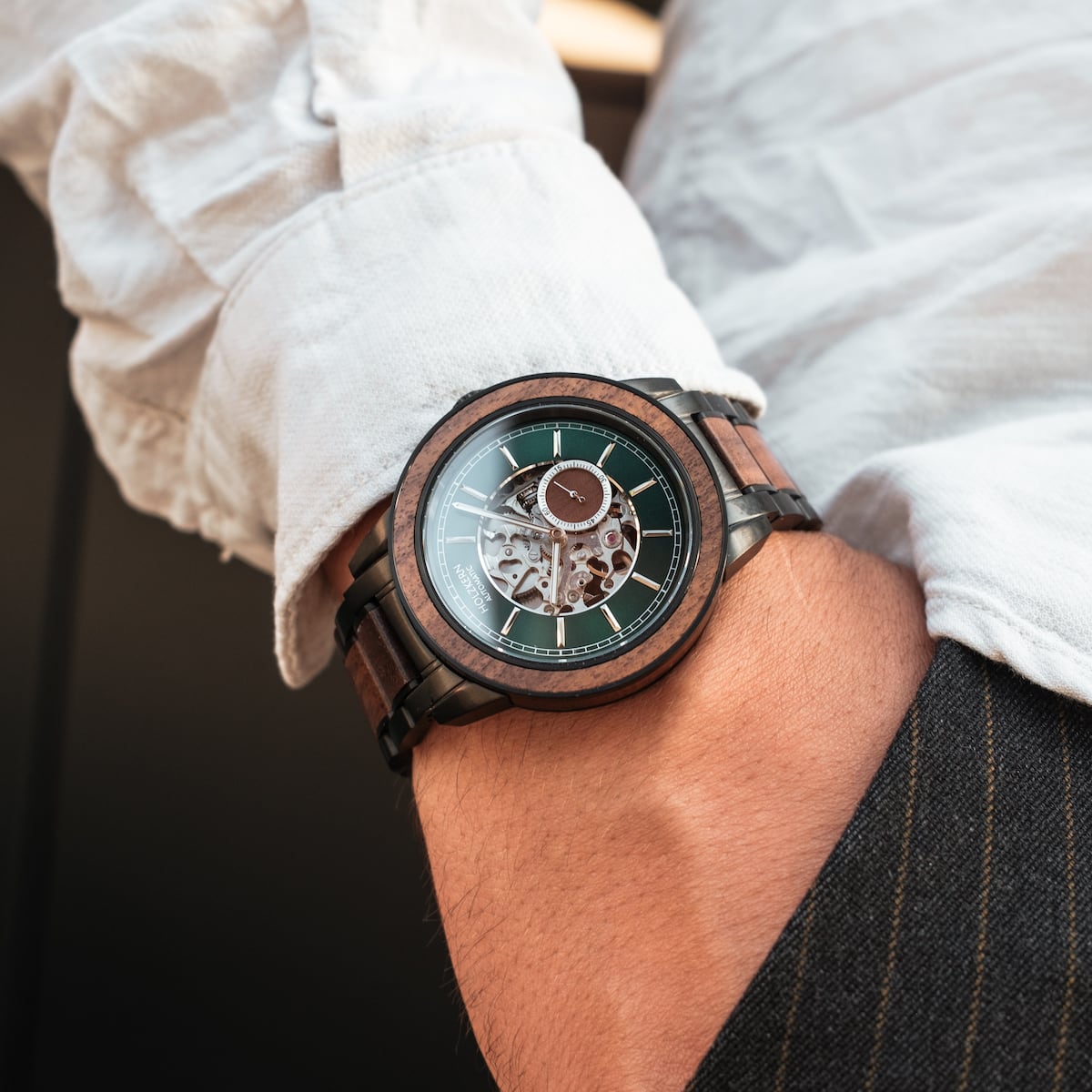 "Sigiriya" wristwatch featuring a walnut finish and elegant design.