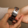 "Koh Mak", a stylish watch featuring a walnut and marble design with a polished, modern finish.