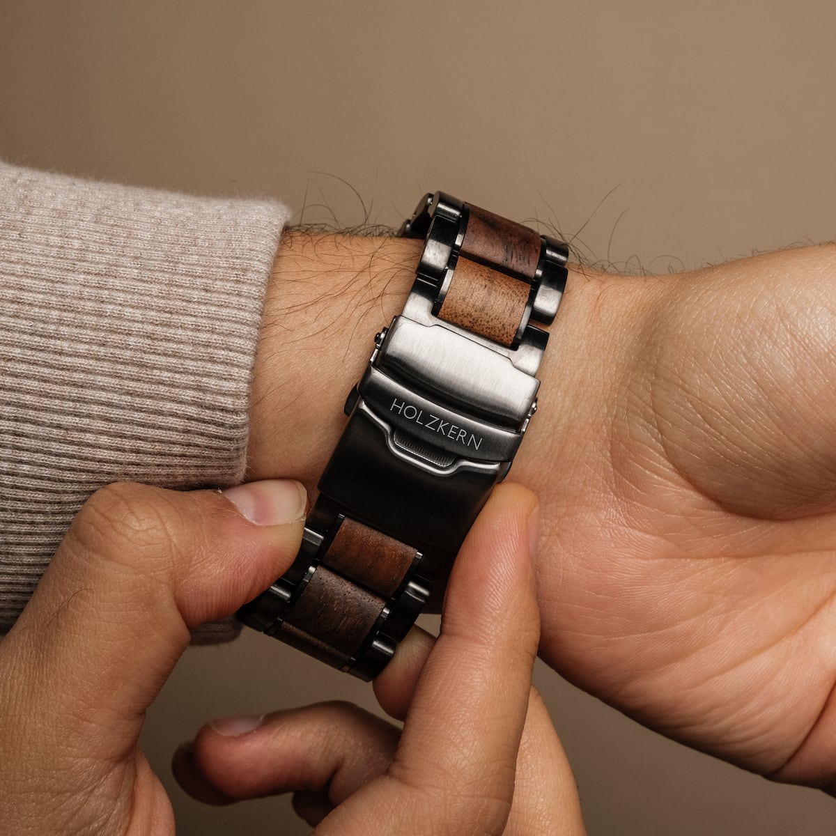 "Lipan" watch featuring a walnut strap and stainless steel accents.