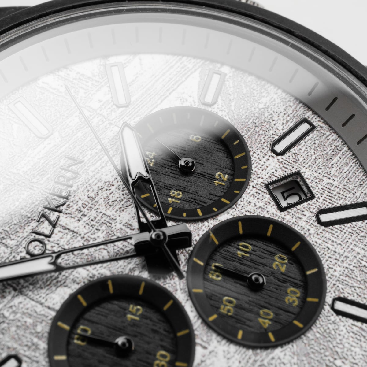 "Northwall" watch featuring a maple and rock gray design with a textured dial and subdials.