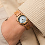 "Antrim" watch featuring an olive and nacre design with a stylish, elegant appearance.