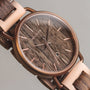 "Belvue" watch with a walnut-themed design, featuring a wooden dial and band for a sophisticated, natural look.