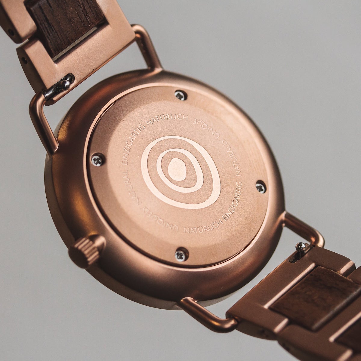 "Belvue" watch featuring a walnut design with a sleek, modern style.