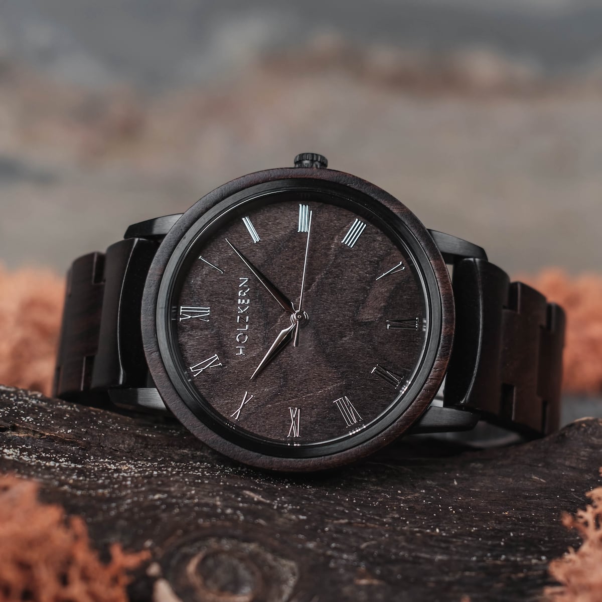 "Carlos" watch with a sleek maple finish and minimalist design.