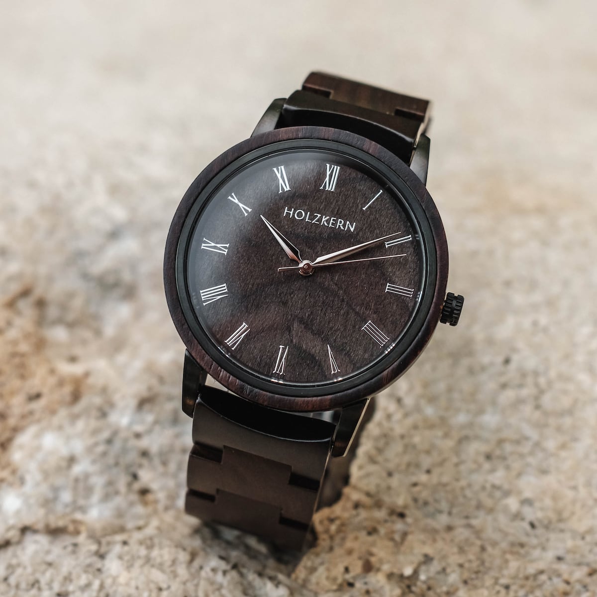 "Carlos" watch, featuring a classic design with a maple wood finish and striking dark tones.