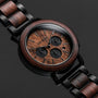 "Dusk" watch, featuring a walnut and black finish, showcases a sleek and elegant design.
