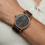 "Spring Evening" elegant wooden watch with a walnut and leadwood finish, featuring a rustic, natural style.
