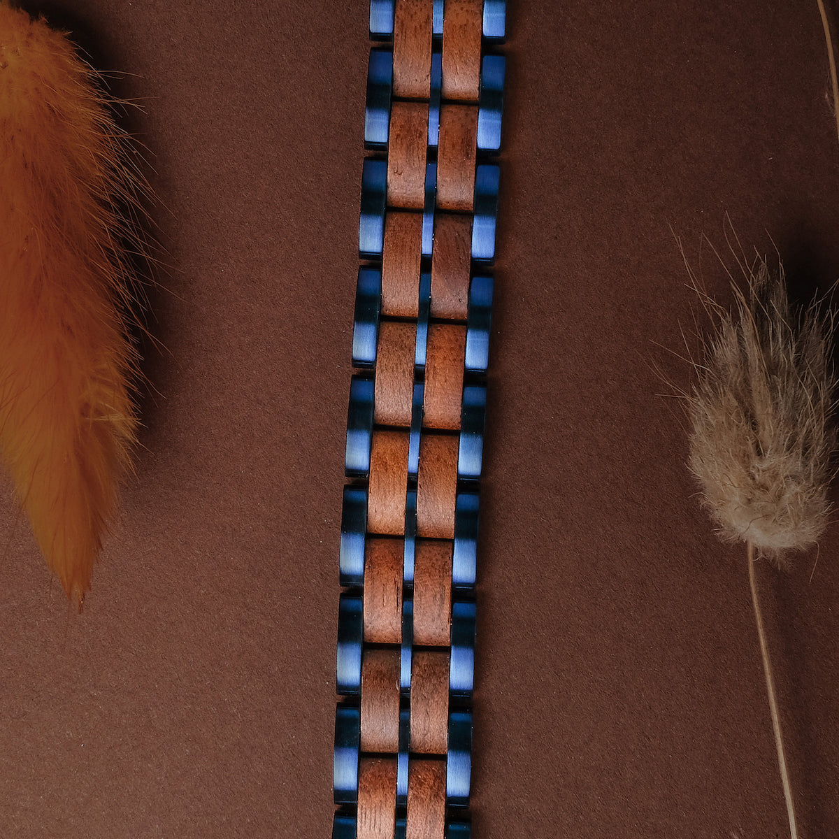 "Kanon" stylish bracelet featuring walnut and blue accents.