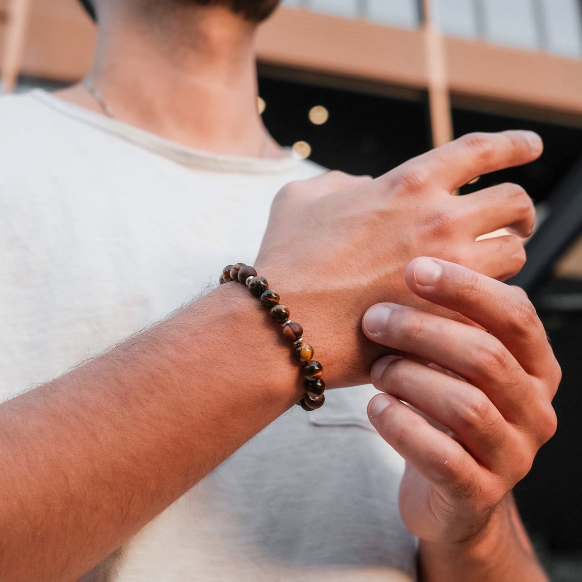 "Superset" bracelet, featuring Tiger Eye and Walnut beads, showcasing a natural and stylish design.