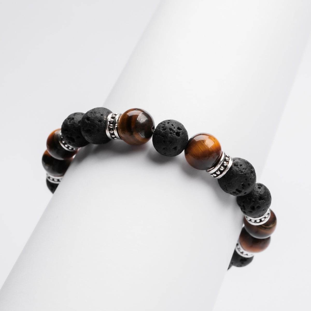 "Superset" bracelet featuring Tiger Eye and Lava stones with a sleek, natural design.