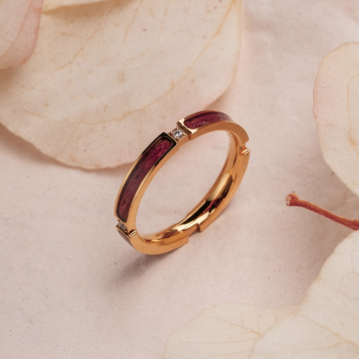 "Campania Ring" ring featuring maple wood accents and a gold finish, set on a soft, natural background.