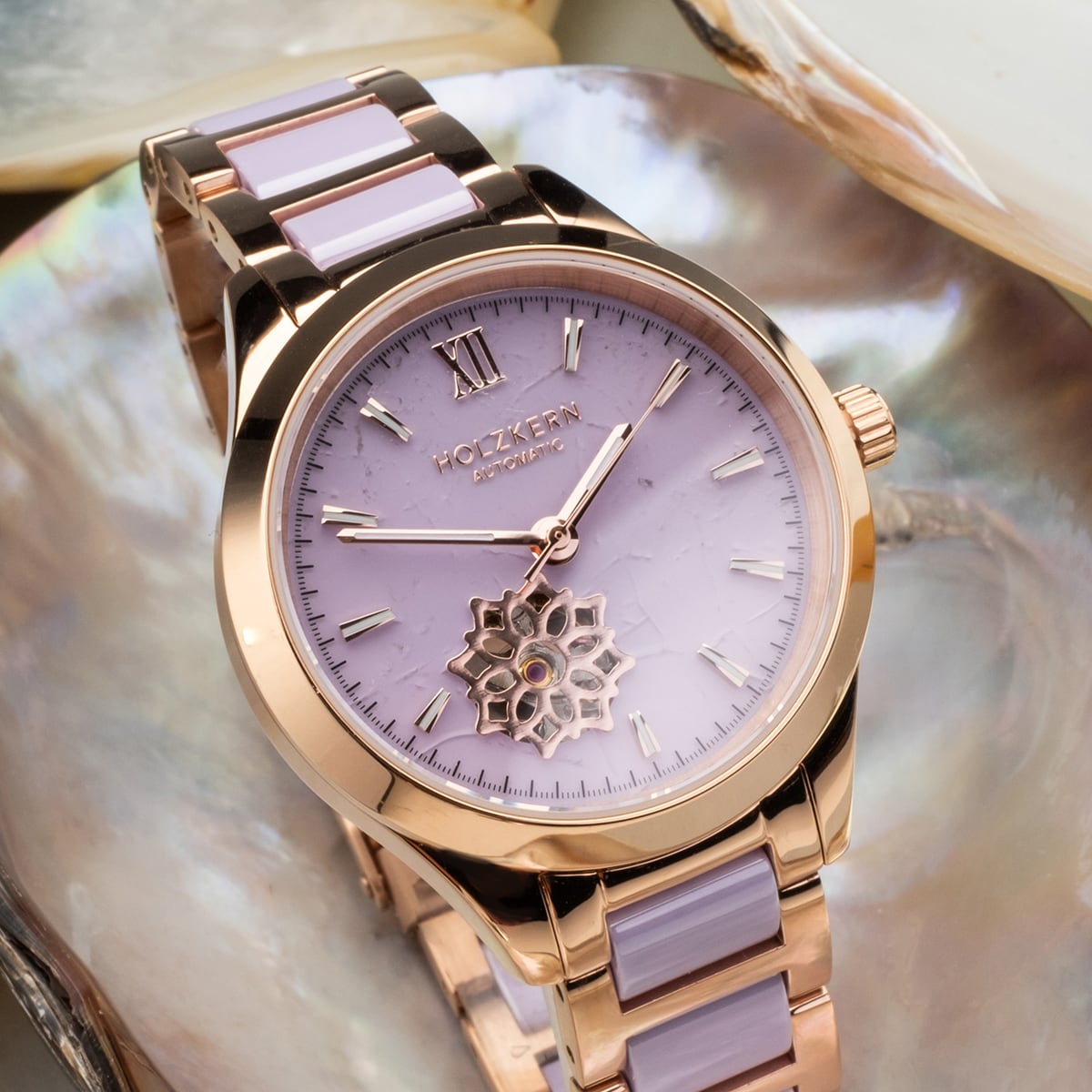 "Kaleidoscopic" watch featuring amethyst and ceramic materials with an elegant design.