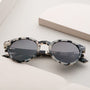 "The Hyped" sunglasses with a stylish Leadwood and White Havana frame.