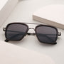 "The Logician", stylish sunglasses featuring a Leadwood frame and Antique Silver accents.