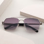 "The Professor" sunglasses with a walnut and antique silver finish, featuring a sleek and sophisticated design.