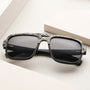 "The Triumphant" sunglasses with a modern design in sleek maple and slate finish, offering a contemporary visual style.