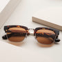 "The Virtuoso" sunglasses in a tortoiseshell design with a classic, elegant walnut and havana finish.