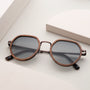 "The Wanderer" sunglasses featuring a stylish walnut and bronze design.