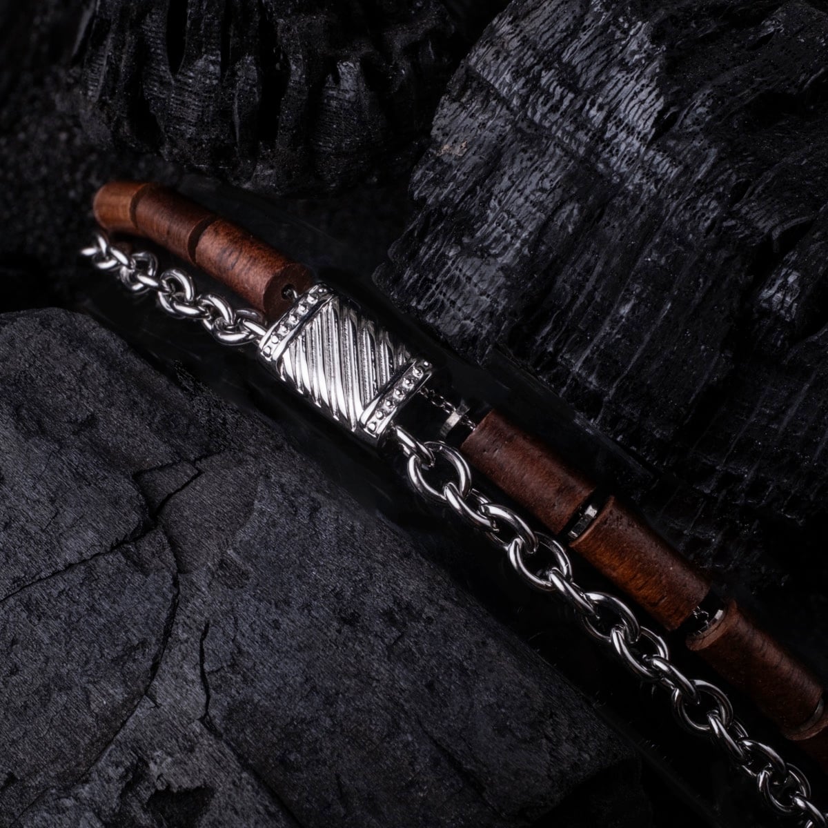 "Supersonic" bracelet featuring Walnut and Silver Elements with a sleek chain design.