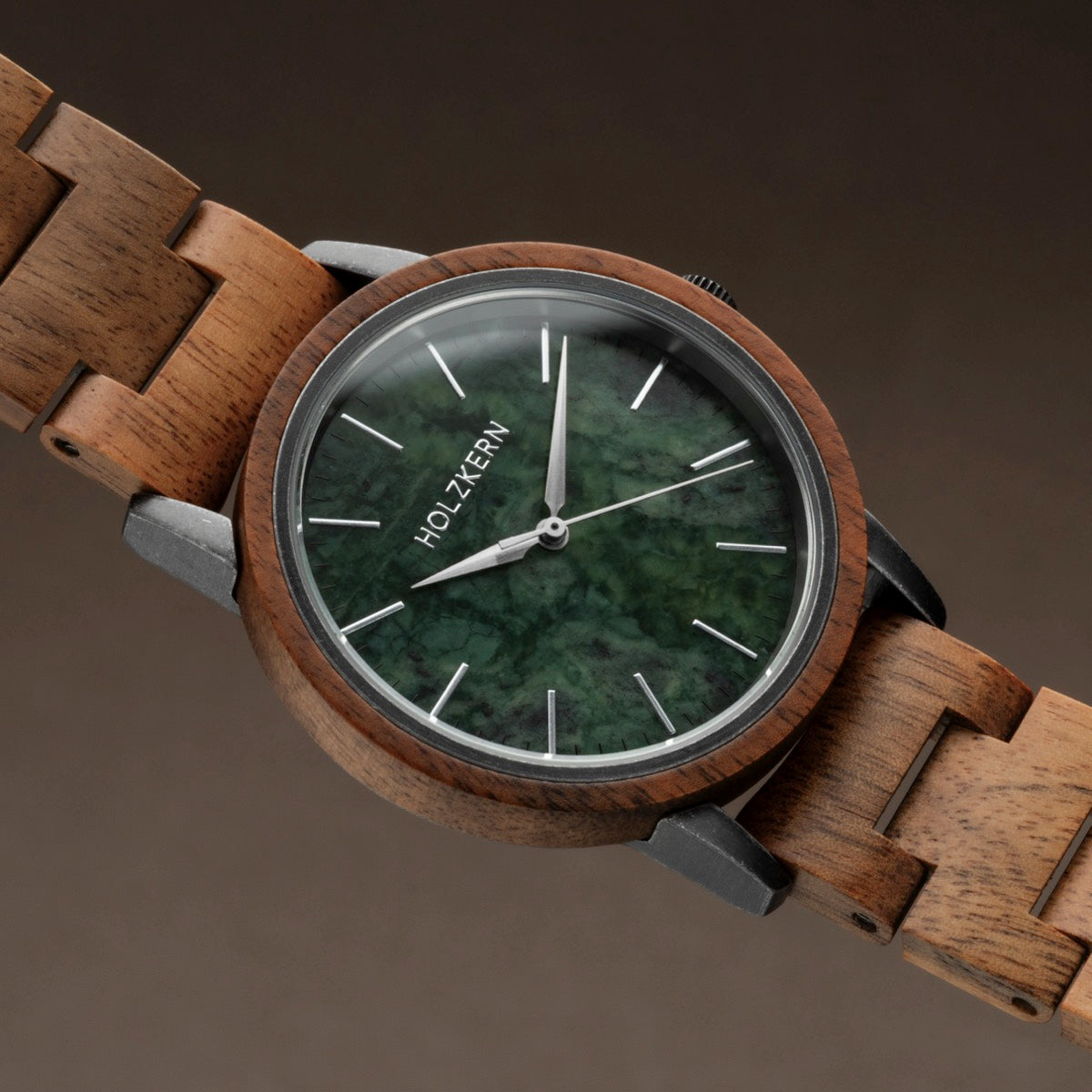 "Bob, a stylish wooden watch with a green marble dial, showcasing a blend of natural elegance and craftsmanship."