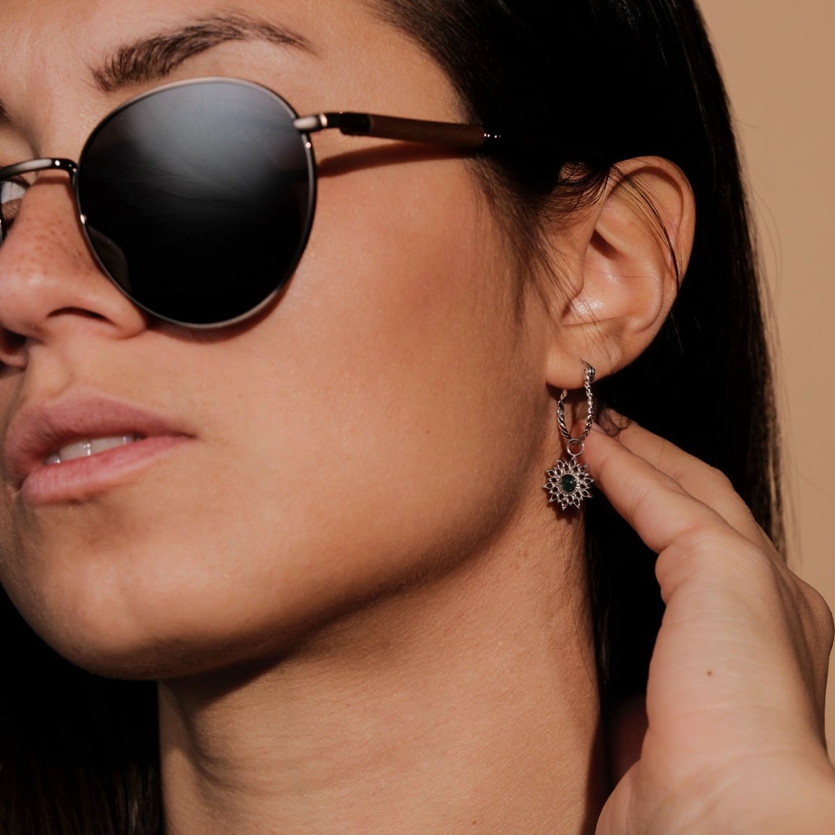 Suncatcher earrings with a marble and silver design, showcasing intricate and elegant style.