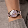 "Kaleidoscopic" watch with a ceramic band and amethyst style, featuring a kaleidoscopic design.
