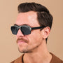 "The Triumphant" sunglasses featuring a sleek maple and slate design.