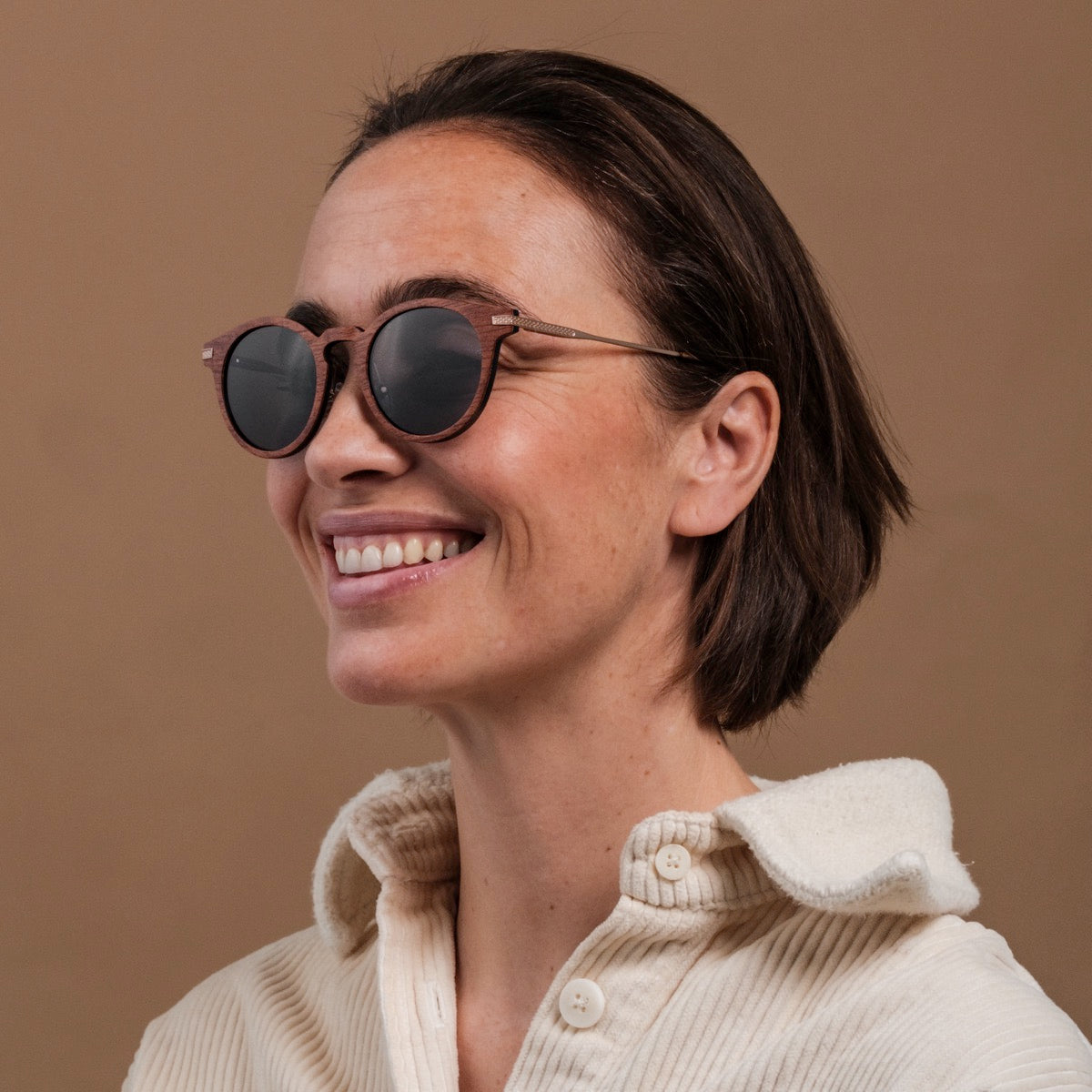"The Maverick" sunglasses featuring a stylish Padouk wood and Copper frame.