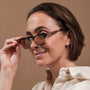 "The Virtuoso" sunglasses featuring a stylish walnut and havana finish.