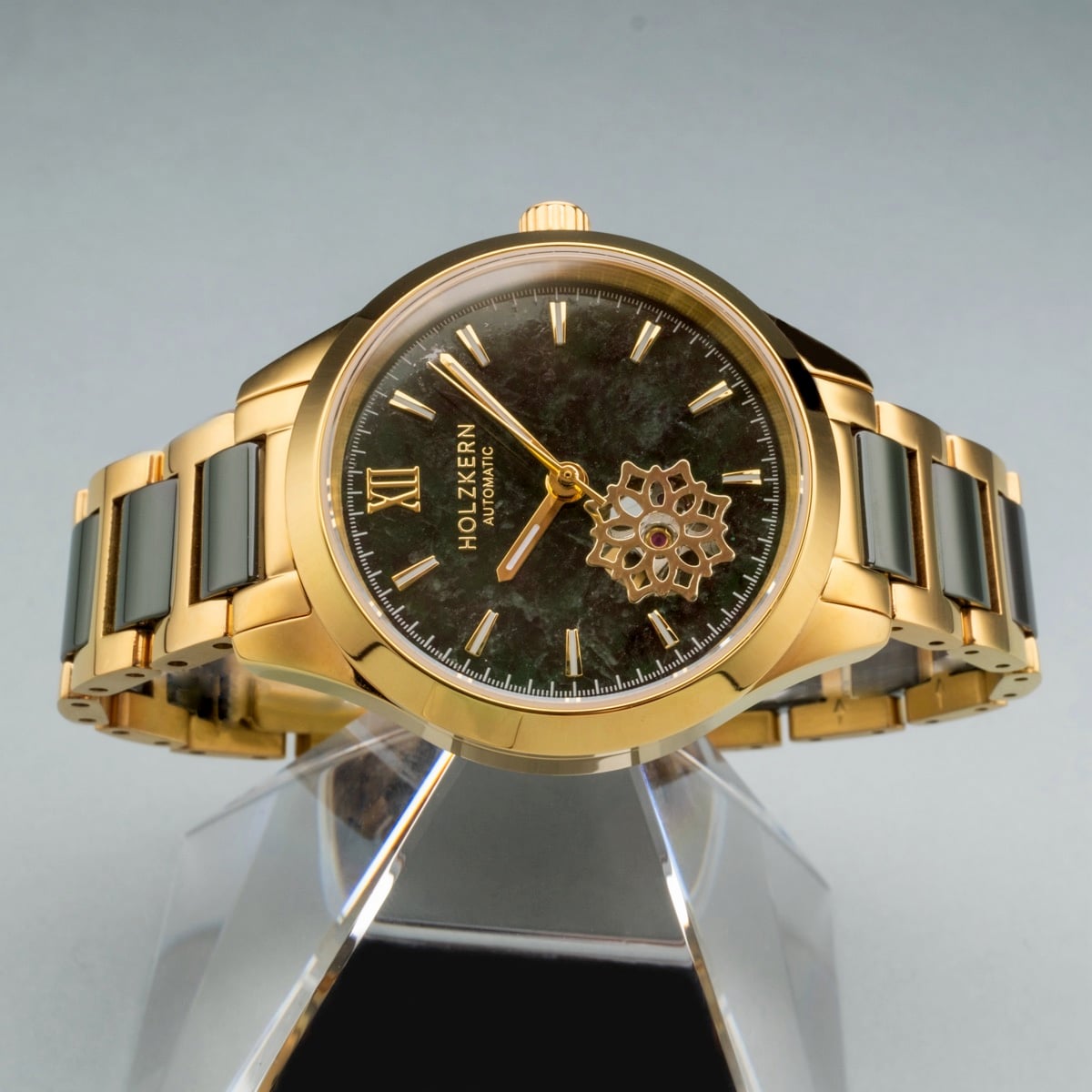"Kaleidoscopic" watch, featuring a jade and ceramic finish with a striking gold design.