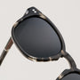 "The Comedian" sunglasses, stylish with a Leadwood frame and Khaki Dust accents.