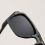 "The Triumphant" sunglasses, featuring a rugged maple and slate design with a bold, modern aesthetic.