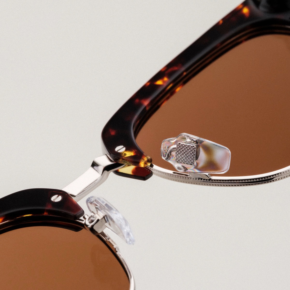 "The Virtuoso" sunglasses feature a classic walnut and havana style for a sophisticated look.