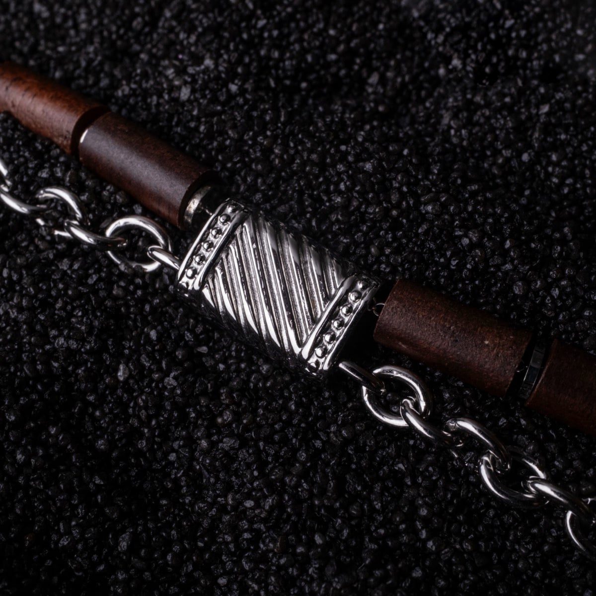 "Supersonic", a stylish bracelet featuring walnut and silver accents.