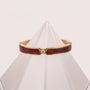 "Campania Ring" - Elegant ring featuring maple wood and gold accents with a minimalist design.