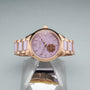 "Kaleidoscopic" watch featuring a rose gold and ceramic bracelet with an amethyst dial and intricate design.