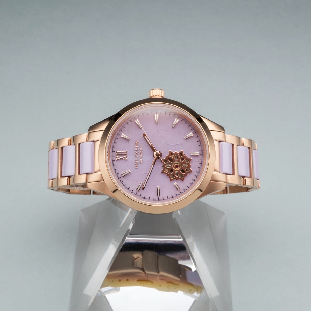 "Kaleidoscopic" watch featuring a rose gold and ceramic bracelet with an amethyst dial and intricate design.