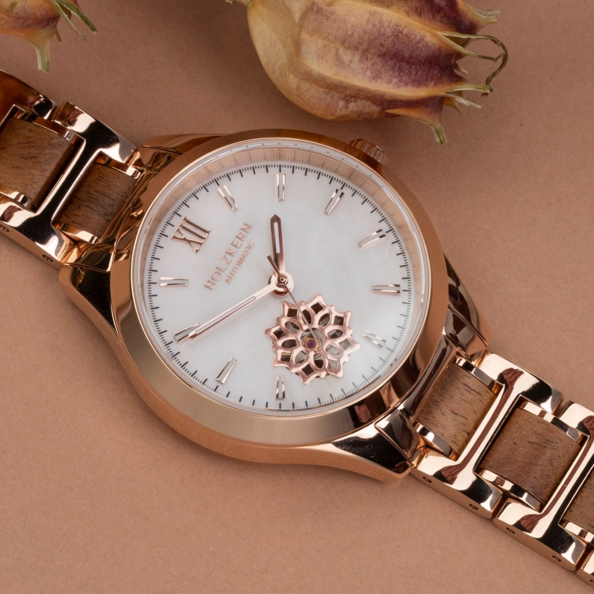 "Kaleidoscopic" watch featuring a nacre dial and koa wood accents, showcasing an elegant and sophisticated aesthetic.