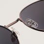 "The Achiever", sleek sunglasses in walnut and copper with a modern style.
