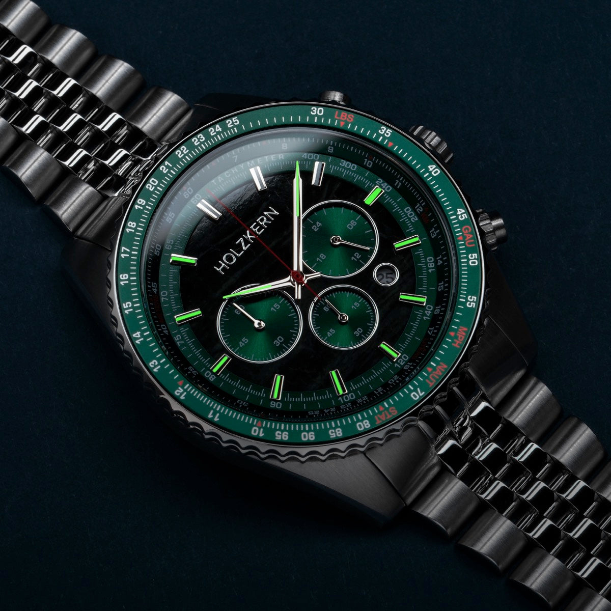 "Openhorizon", a stylish watch featuring a green marble face and silver accents.