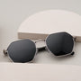 "The Magical" sunglasses in hexagonal shape featuring maple frames and antique silver accents.