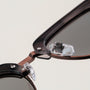 "The Virtuoso" sunglasses, featuring a sleek blend of Leadwood and Ash for a modern, stylish look.