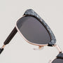 "The Virtuoso" sunglasses featuring a Leadwood/Black havana style with sleek, sophisticated design.