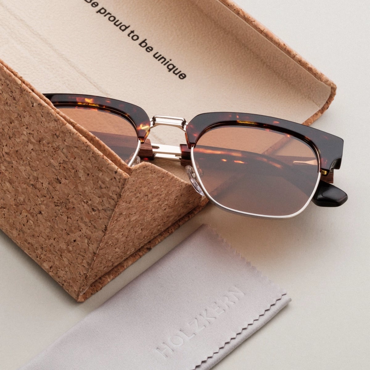 "The Virtuoso" sunglasses featuring a walnut and havana design in an elegant style.