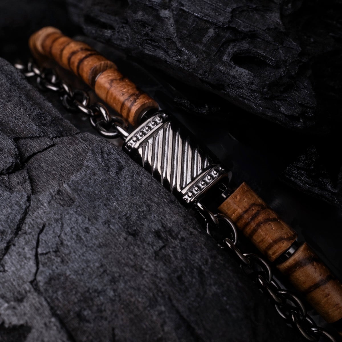 "Supersonic" bracelet featuring zebrawood and gray metal accents with a sleek, stylish design.